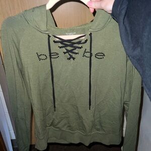 bebe green hoodie with black rhinestones